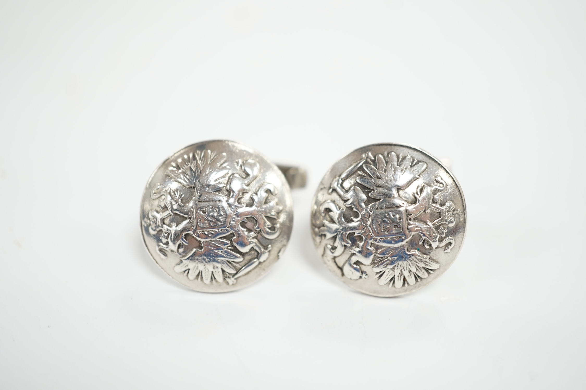 A pair of Russian 925 circular button cufflinks, embossed with the Coat of Arms of Russia, verso with maker in Cyrillic, St Petersburg, diameter 20mm.